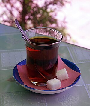 Turkish tea with sugar and spoon.jpg