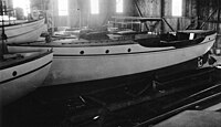 Zenda in a boathouse while in private use between 1912 and 1917. USS Zenda (SP-688) in boat house as private boat.jpg