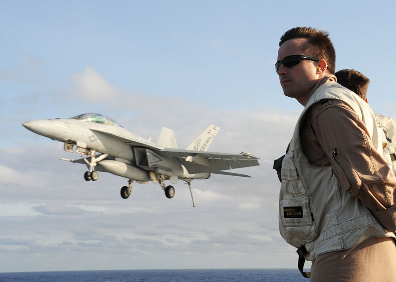 File:US Navy 100513-N-3620B-085 Lt. Elliott Shoup watches as an F-A-18F Super Hornet assigned to VFA-11 performs an arrested landing aboard the USS Enterprise (CVN 65).jpg