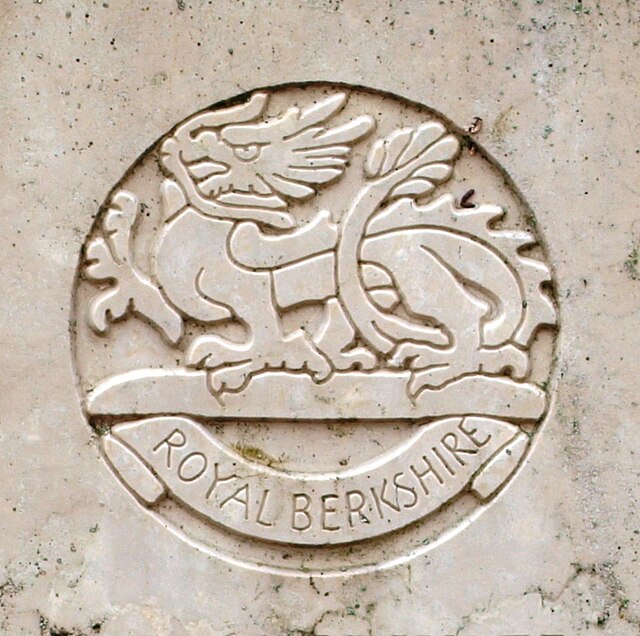 Cap badge of the Royal Berkshire Regiment as shown on a First World War grave at Vouziers military cemetery