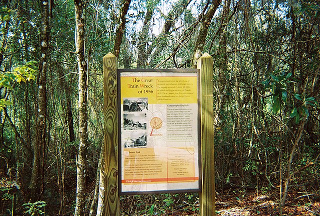 Sign on the Withlacoochee State Trail marking the site of the "Great Train Wreck of 1956" at Pineola, Florida.