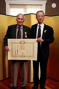 Ursuliak was given the Order of the Rising Sun, Gold and Silver Rays from Kunihiko Tanabe, Consul-General of Japan in Calgary, on 15 June 2017. Wally Ursuliak and Kunihiko Tanabe 20170615.jpg