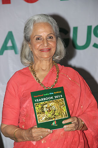 Waheeda Rehman releases the 'TIFF 2015 Yearbook'. The book has one of her tiger clicks shot in Madhya Pradesh on the cover-page. Yearbook release.jpg