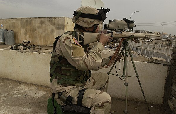 A sniper from the 25th Infantry Division on patrol in Mosul, Iraq.