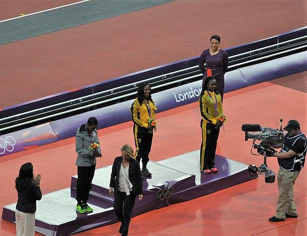 2012 Olympic 100 m medal ceremony: Shelly-Ann Fraser-Pryce (gold), Carmelita Jeter (silver), Veronica Campbell-Brown (bronze).