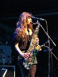 Abi Harding playing the saxophone in 2008