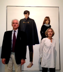 Jerry and Amy Kaplan standing in front of the 1964 oil on canvas painting by Wayne Thiebaud, Amy and Jerrold, Children of the Sixties Amy and Jerrold Painting.png