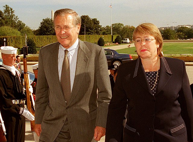 Bachelet, as Minister of Defense, meeting with U.S. Secretary of Defense Donald Rumsfeld in 2002