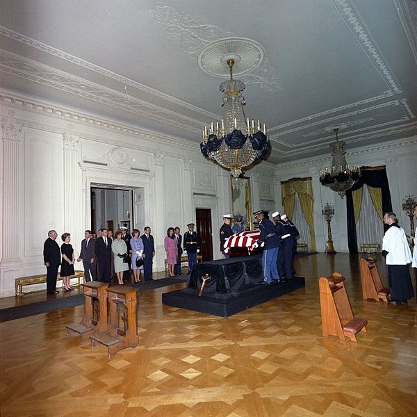 File:Body of JFK being placed on catafalque in East Room.jpg