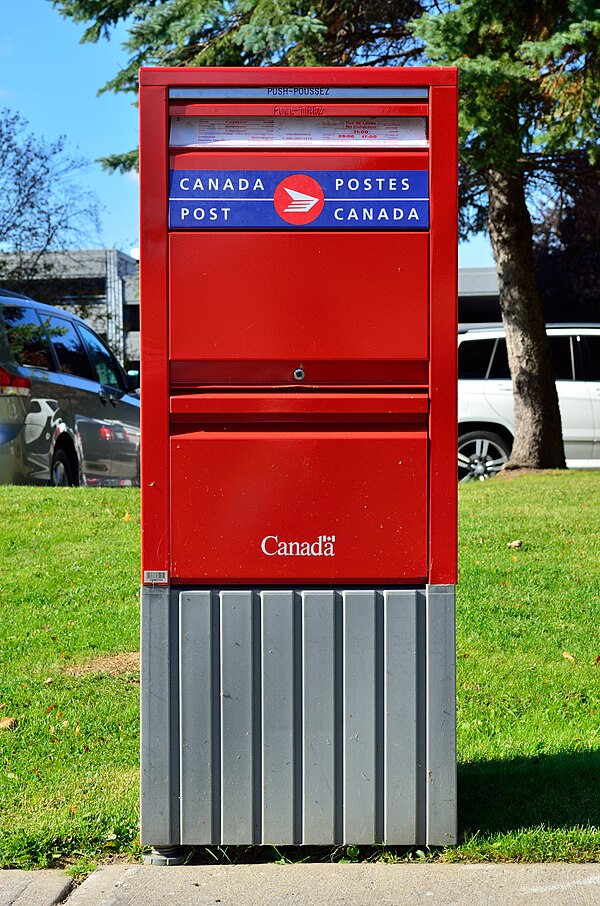 Red Canada Post mailbox.