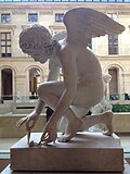 Амур, ловящий бабочку. 1817. Мрамор. Лувр, Париж