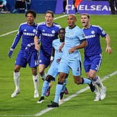 Kompany playing for City against Chelsea, 2015 Chelsea 1 Man City 1 (16228228237).jpg