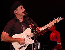 Clint Black's album Killin' Time, which had first reached number one in 1989, continued to spend time in the top spot for much of 1990. ClintBlackperforming.jpg