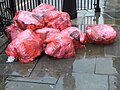 Commercial waste collection bags on Regent Street, London.jpg