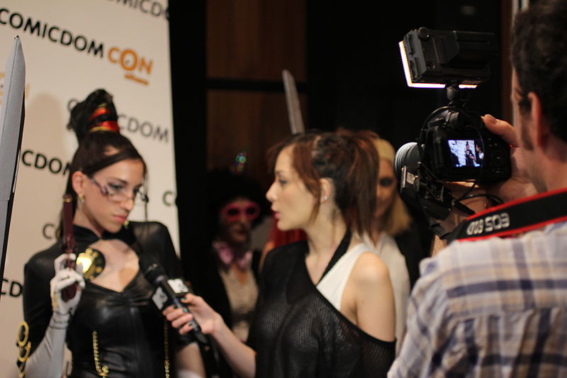 File:Cosplayers at Comicdom 2012 in Athens, Greece grant interviews to the MTV television channel 13.JPG