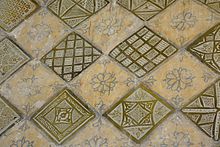 Ceramic tiles around the mihrab of the Great Mosque of Kairouan (9th century), believed to have been imported from Abbasid Iraq Details du Mihrab 03.jpg