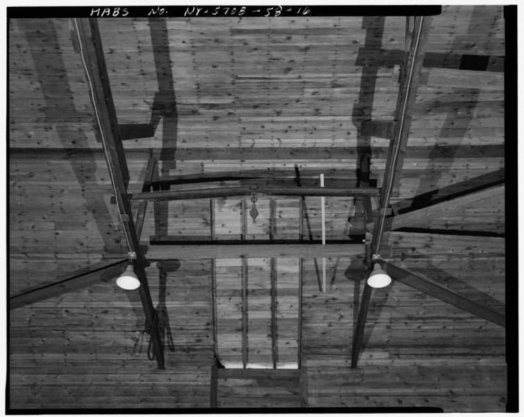 File:DETAIL OF ROOF TRUSS SYSTEM, FACING EAST, THIRD BAY Showing bottom chords and diagonal braces of roof trusses, hoist I-beam and pulley. - U.S. Military Academy, Ice House, HABS NY,36-WEPO,1-58-16.tif