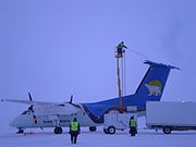 De-icing a Canadian North Dash 8 at Cambridge Bay Airport