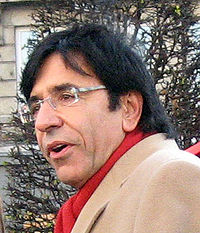 Elio Di Rupo, the first full-time openly gay male national leader, in 2007 Elio di Rupo-15-12-2007.jpg