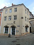 Jacobi dye works;  Residential house in closed development, corner house, with courtyard building of an old black dye works