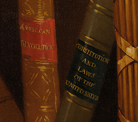 Detail of the book bindings in the White House's copy of the Lansdowne portrait. "UNITED STATES" is spelled as "UNITED SATES" to distinguish the copy.