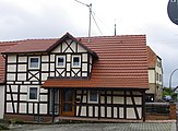 This is a picture of the Bavarian Baudenkmal (cultural heritage monument) with the ID D-6-78-174-102 (Wikidata) Humprechtshäuser Straße 4, Reichmanshausen, Gemeinde Schonungen, Unterfranken; Deutschland