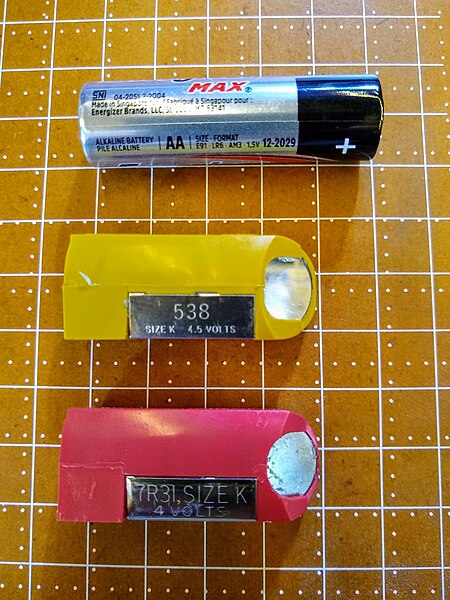 File:K-Battery compared to an AA battery.jpg