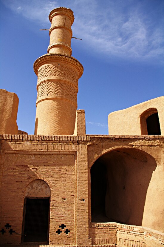 Old adobe minaret in Kharanagh village, Iran