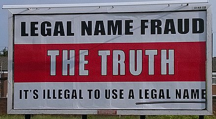 Billboard promoting the freeman on the land "legal name fraud" trope in the United Kingdom[49]