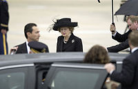 Thatcher exiting a limousine on the ramp at Andrews Air Force Base