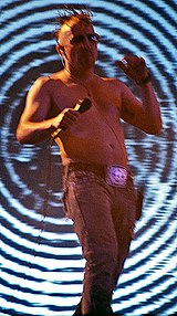 Maynard James Keenan, the band's co-founder and primary lyricist, who balances his time between the band and Tool. Maynard James Keenan Roskilde 2.jpg