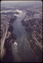 Thumbnail for File:NIAGARA RIVER LOOKING SOUTH, WITH THE FALLS IN THE BACKGROUND. DISCOLORED WATER IN LOWER LEFT IS SEWAGE DISCHARGE... - NARA - 549496.tif