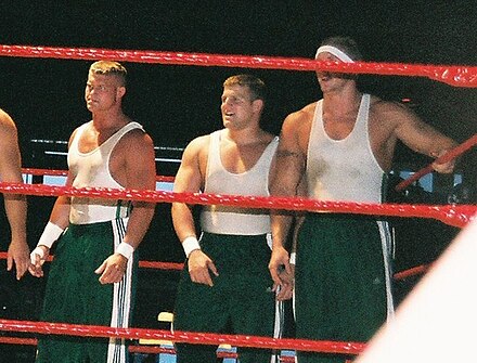 Nicky (Dolph Ziggler) (left) with Mikey and Kenny as part of the Spirit Squad in 2006