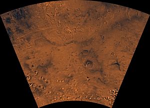 Image of the Thaumasia Quadrangle (MC-25). The northern part includes Thaumasia plateau. The southern part contains heavily cratered highland terrain and relatively smooth, low plains, such as Aonia Planum and Icaria Planum. Parts of Solis Planum, Aonia Terra, and Bosporus Planum are also found in this quadrangle. The east-central part includes Lowell Crater. PIA00185-MC-25-ThaumasiaRegion-19980605.jpg