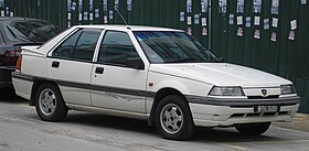 Proton Saga Iswara (Aeroback) (depan), Serdang.jpg