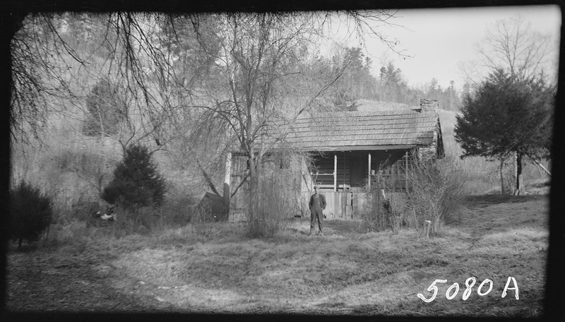 File:Revis, Aubrey, in front of his home - NARA - 280550.tif