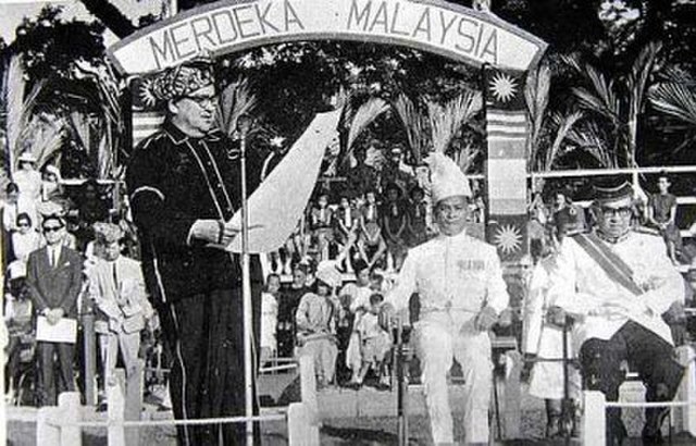 Donald Stephens (left) declaring the forming of the Federation of Malaysia at Merdeka Square, Jesselton on 16 September 1963. Together with him was th
