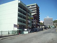 The longstanding downtown United Church with next door office building in 2013 were replaced with one building, the church on the ground floor. Site of POM downtown UC being redeveloped.jpg