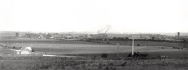Islington workshops, where large numbers of locomotives and rolling stock were designed and built from 1883. Photo taken between 1915 and 1927, before the encroachment of Adelaide's suburbs. South Australian Railways Islington Workshops -- distant view pre 1927 (SLSA B4403).jpg