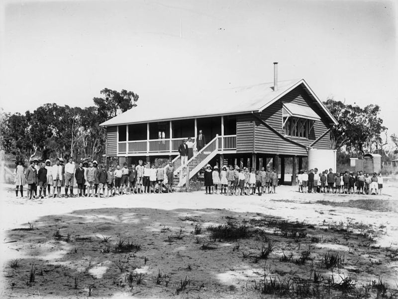 File:StateLibQld 1 106224 Students and teachers gathered outside Amiens State School, 1922.jpg