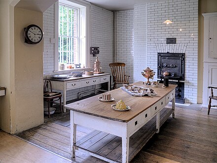 Still room at Tatton Hall, England, 1770s-1810. It contains a cake, a jelly, the china for afternoon tea, and beverage-making apparatus. Still Room, Tatton Hall-geograph-3983489.jpg