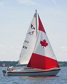 Tanzer 26 with Canadian flag genoa. Tanzer 26 sailboat Clear Sky with Canadian flag genoa 1345.jpg