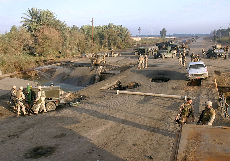 File:US Navy 041113-B-1250B-001 Sailors and Marines assigned to the 24th Marine Expeditionary Unit (24th MEU) survey the remnants of a bridge in Lutafiyah, Iraq.jpg