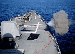 US Navy 120119-N-ZF681-334 The MK-45 5-inch-54-caliber lightweight gun aboard the guided-missile destroyer USS Halsey (DDG 97) fires .jpg