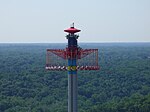 WindSeeker stationary at the top of the tower during testing, as seen from the park's 1/3 scale replica of the Eiffel Tower. Taken June 14, 2011.