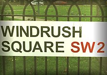 In 1998, an area of public open space in Brixton was renamed Windrush Square to commemorate the 50th anniversary of the arrival of the ship bringing one of the first large groups of West Indian migrants to the United Kingdom. Windrush square.jpg