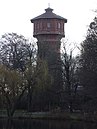 Water tower with machine house and house