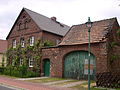 Residential house, barn, passage and shed of a four-sided courtyard