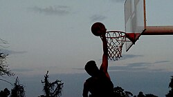Basketball at Manipal University Jaipur Basketball dunk in India.jpg