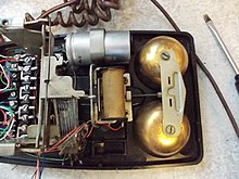 Electromechanical ringer in a 20th century landline telephone Bell of the 1900.jpg